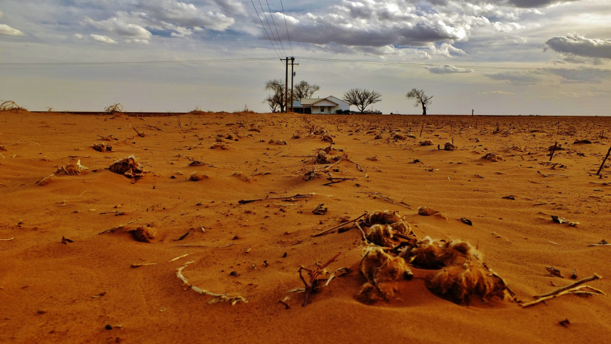 A desolate landscape of dirt and dust with an abandoned house far in the background. (Image credit: NOAA OAR 2014 Photo Contest | Tim Benson) A desolate landscape of dirt and dust with an abandoned house far in the background.