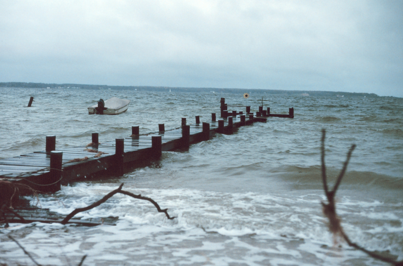 High tide and storm threaten a pier and beach along the Patuxent River (Image credit: Mary Hollinger) High tide and storm threaten a pier and beach along the Patuxent River