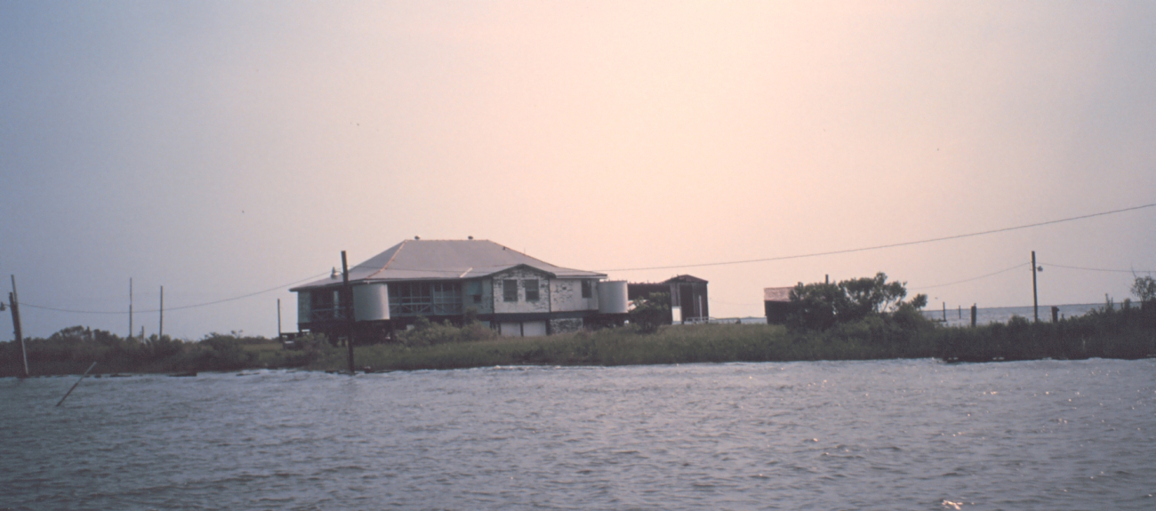 Hunting and fishing camp built on stilts - accessible only by boat althoughpower lines have been run across the marsh (Image credit: Dr. Terry McTigue) Hunting and fishing camp built on stilts - accessible only by boat althoughpower lines have been run across the marsh
