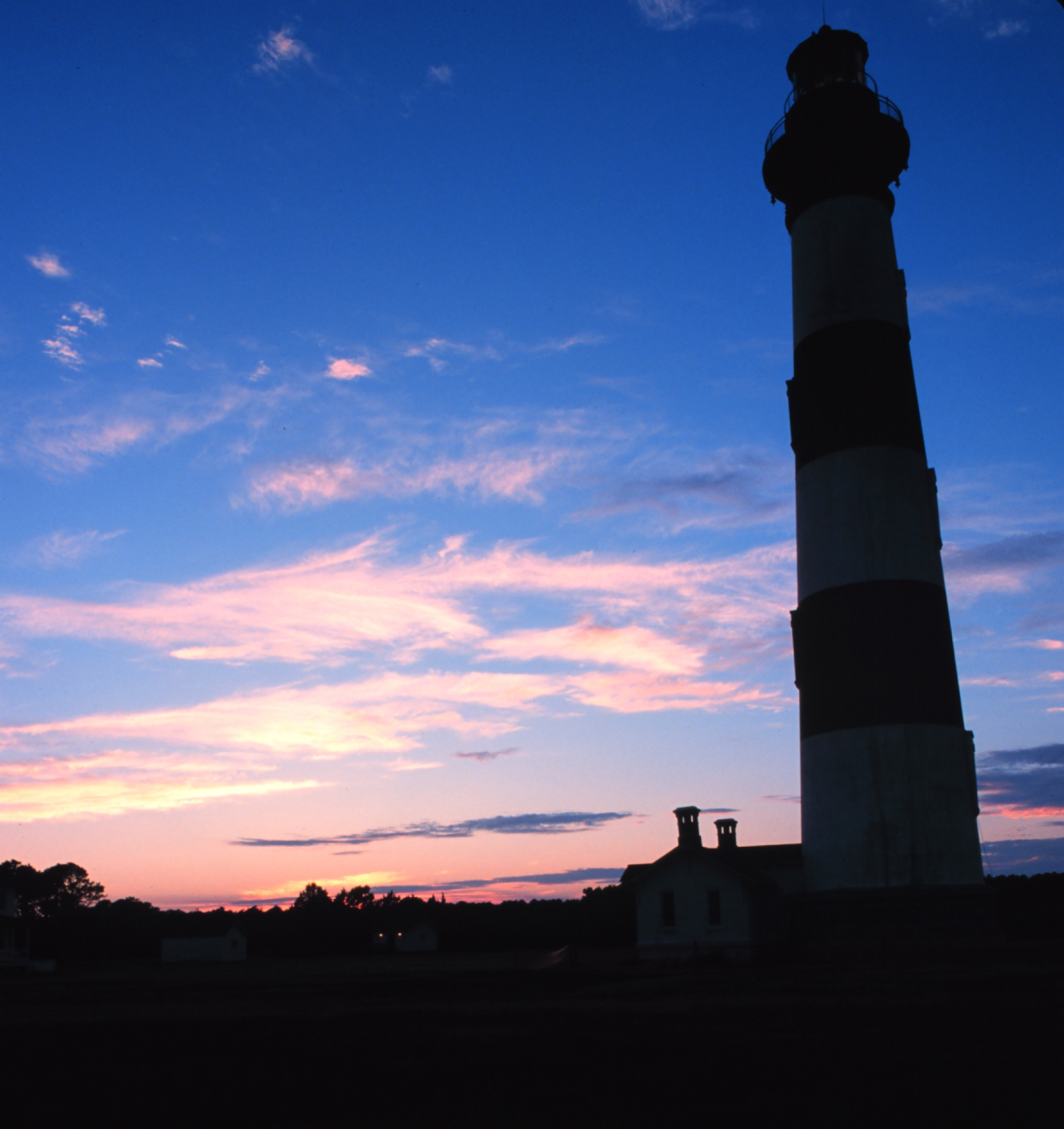 A view of the Bodie Island Lighthouse at sunset