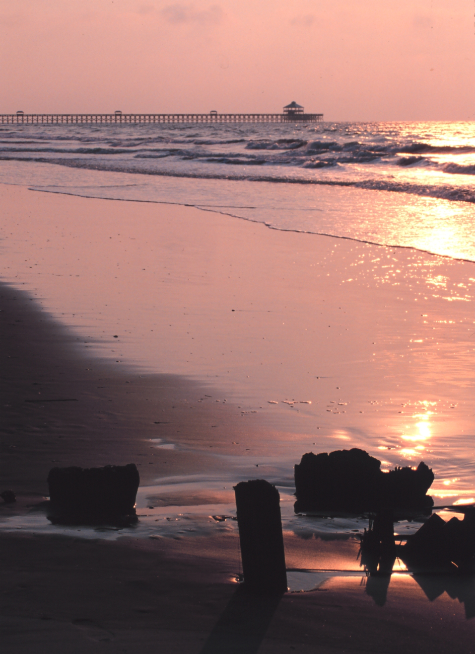 Sun rising through early morning haze reflecting in the surf (Image credit: Mr. William B. Folsom) Sun rising through early morning haze reflecting in the surf
