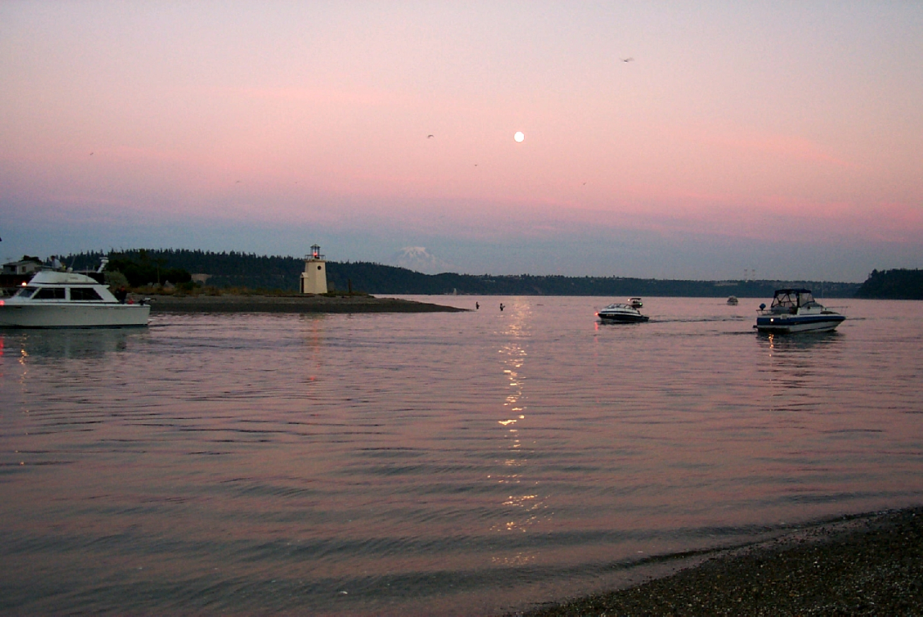 Moonrise over Gig Harbor as salmon fishermen try their luck in the shallows offthe spit (Image credit: Carol Baldwin) Moonrise over Gig Harbor as salmon fishermen try their luck in the shallows offthe spit