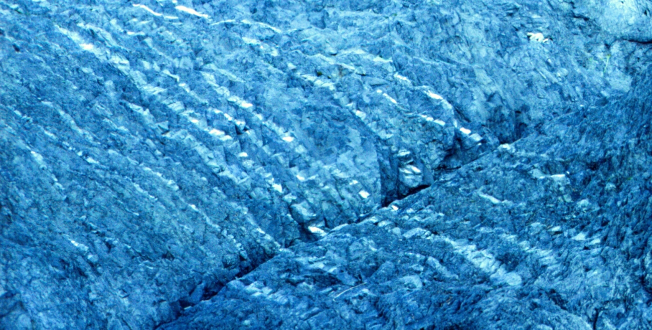 Banded vertical layers of gneiss near Port Etches (Image credit: Commander George Leigh) Banded vertical layers of gneiss near Port Etches