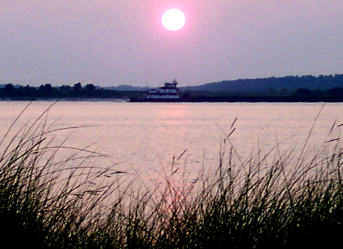 Ferry boat at sunset at the Cape Fear River entrance (Image credit: Captain Albert E. Theberge) Ferry boat at sunset at the Cape Fear River entrance