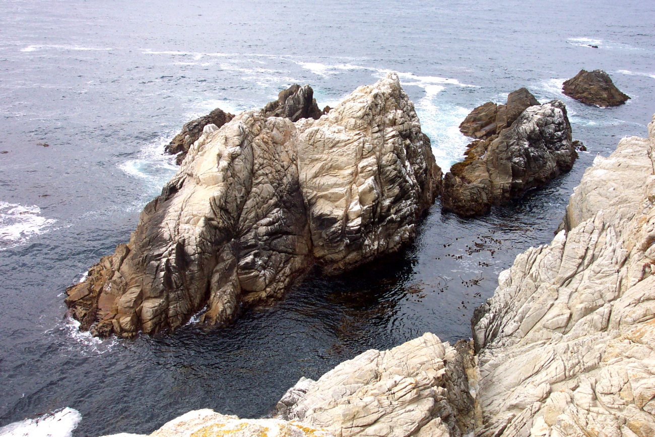 An islet of Santa Lucia Granodiorite, an erosion-resistant rock that underliesmost of the Point Lobos area (Image credit: Captain Albert E. Theberge) An islet of Santa Lucia Granodiorite, an erosion-resistant rock that underliesmost of the Point Lobos area