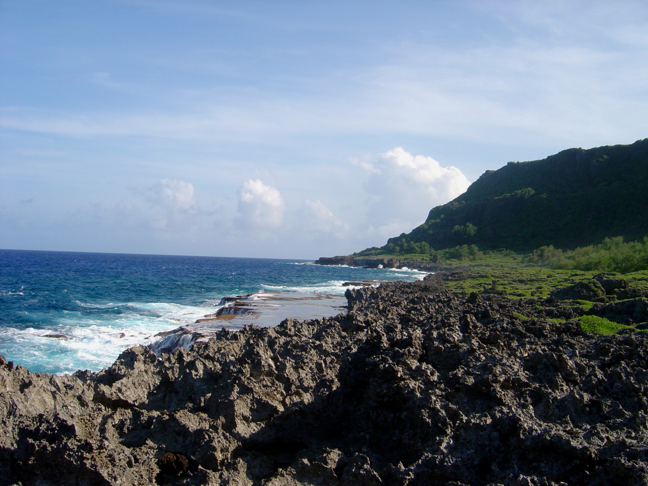 Sharp eroded coral rock makes a treacherous path down to an erodedwave-cut terrace on the Guam coastline (Image credit: David Burdick) Sharp eroded coral rock makes a treacherous path down to an erodedwave-cut terrace on the Guam coastline