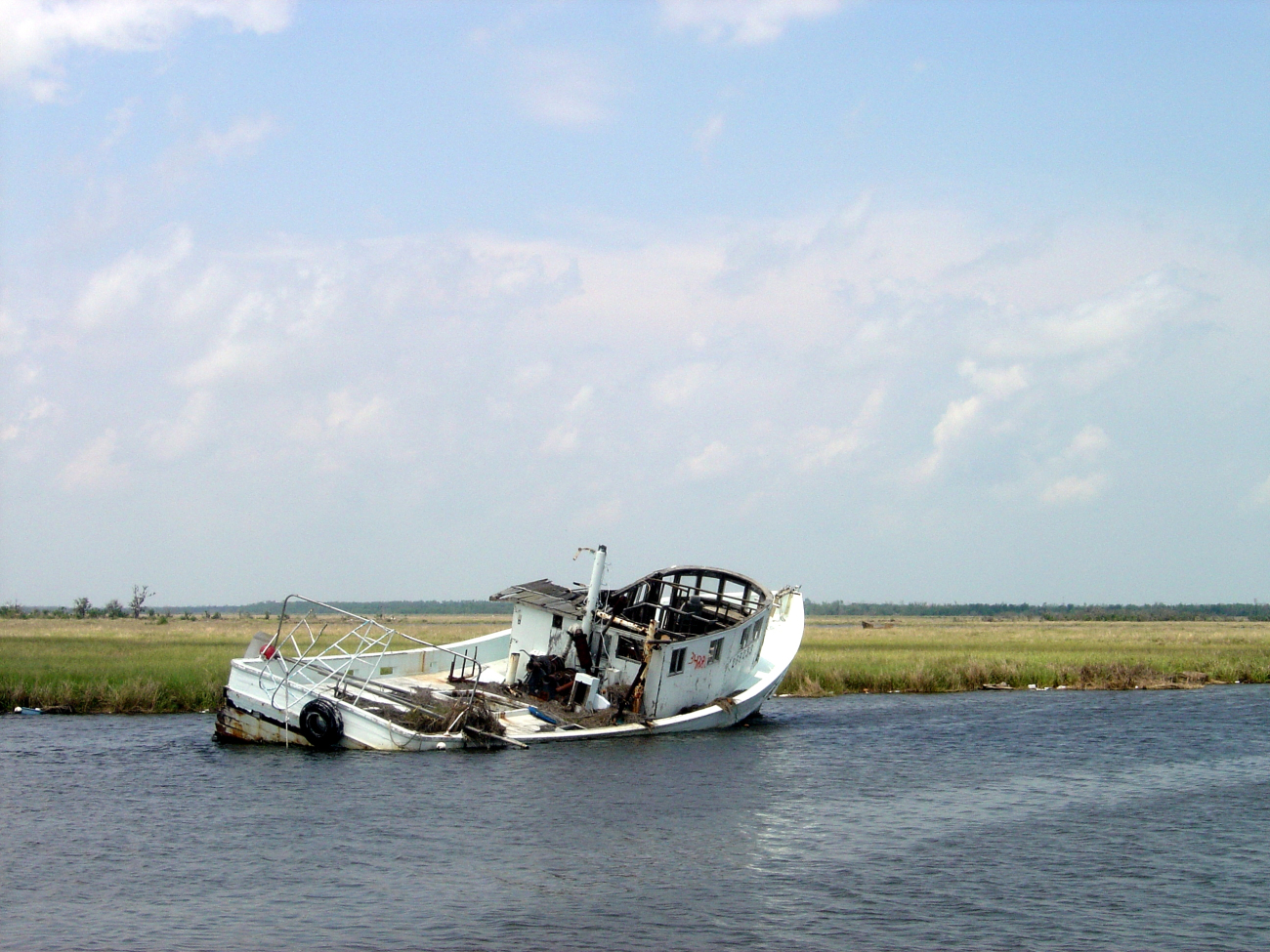 A derelict shrimp vessel stranded in the marsh following Hurricane Katrina (Image credit: Doug Helton) A derelict shrimp vessel stranded in the marsh following Hurricane Katrina