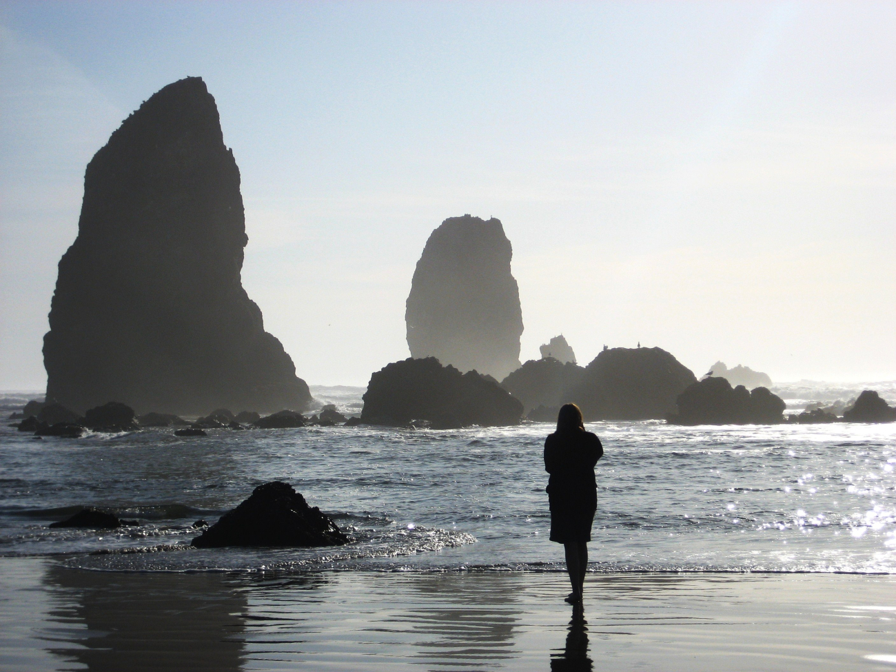 Standing at the edge of a continent with seastacks marching into the sea