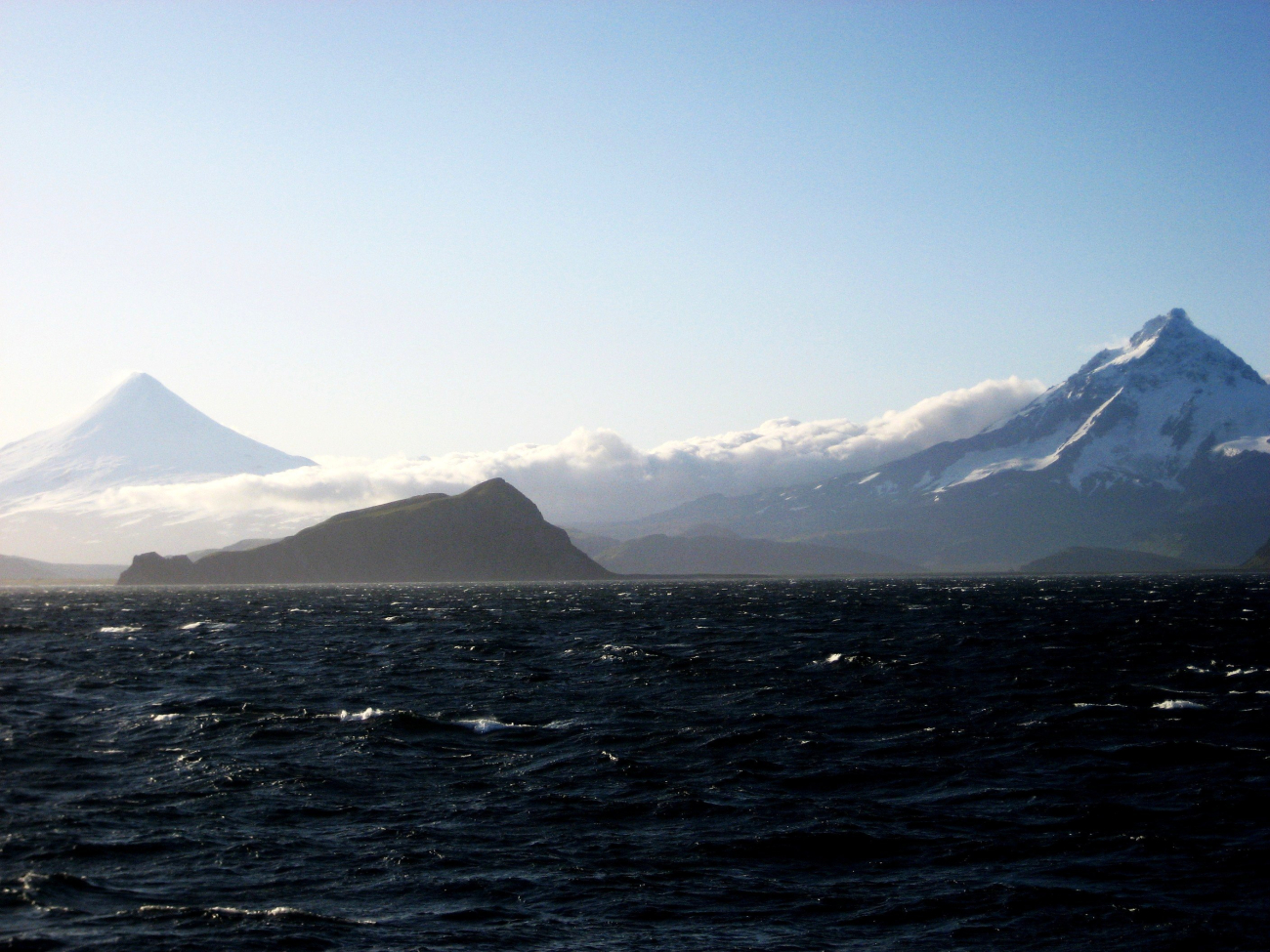 Shishaldin (left) and Isanotski volcanoes on Unimak Island (Image credit: Second Mate Michael Theberge) Shishaldin (left) and Isanotski volcanoes on Unimak Island