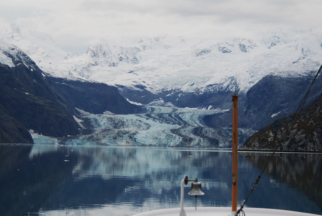 The NOAA Ship FAIRWEATHER's ships bell with Johns Hopkins Glacier in thebackground (Image credit: Ensign Patricia Raymond) The NOAA Ship FAIRWEATHER's ships bell with Johns Hopkins Glacier in thebackground