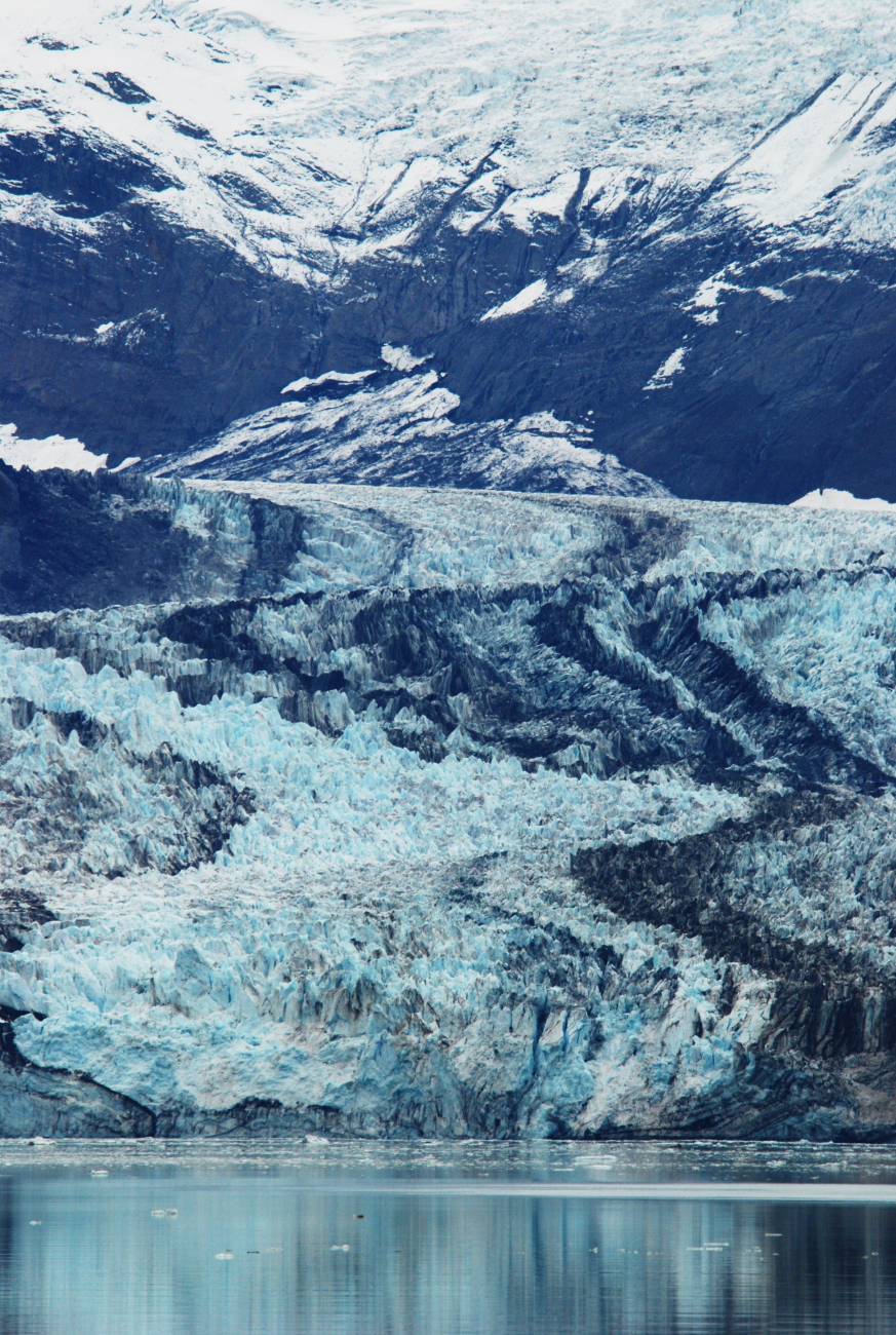 Johns Hopkins Glacier showing the effect of differential melting in areas ofconcentrated rock material (Image credit: Ensign Patricia Raymond) Johns Hopkins Glacier showing the effect of differential melting in areas ofconcentrated rock material
