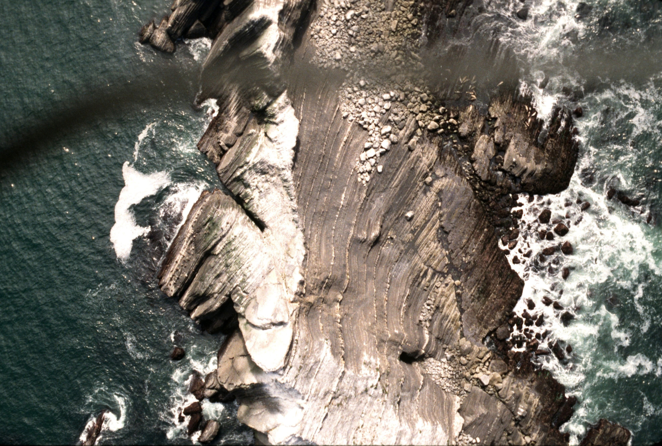 Tilted twisted beds on San Pedro Rock bear evidence to the tortured tectonichistory of coastal California (Image credit: Common Murre Restoration Project, USFWS) Tilted twisted beds on San Pedro Rock bear evidence to the tortured tectonichistory of coastal California