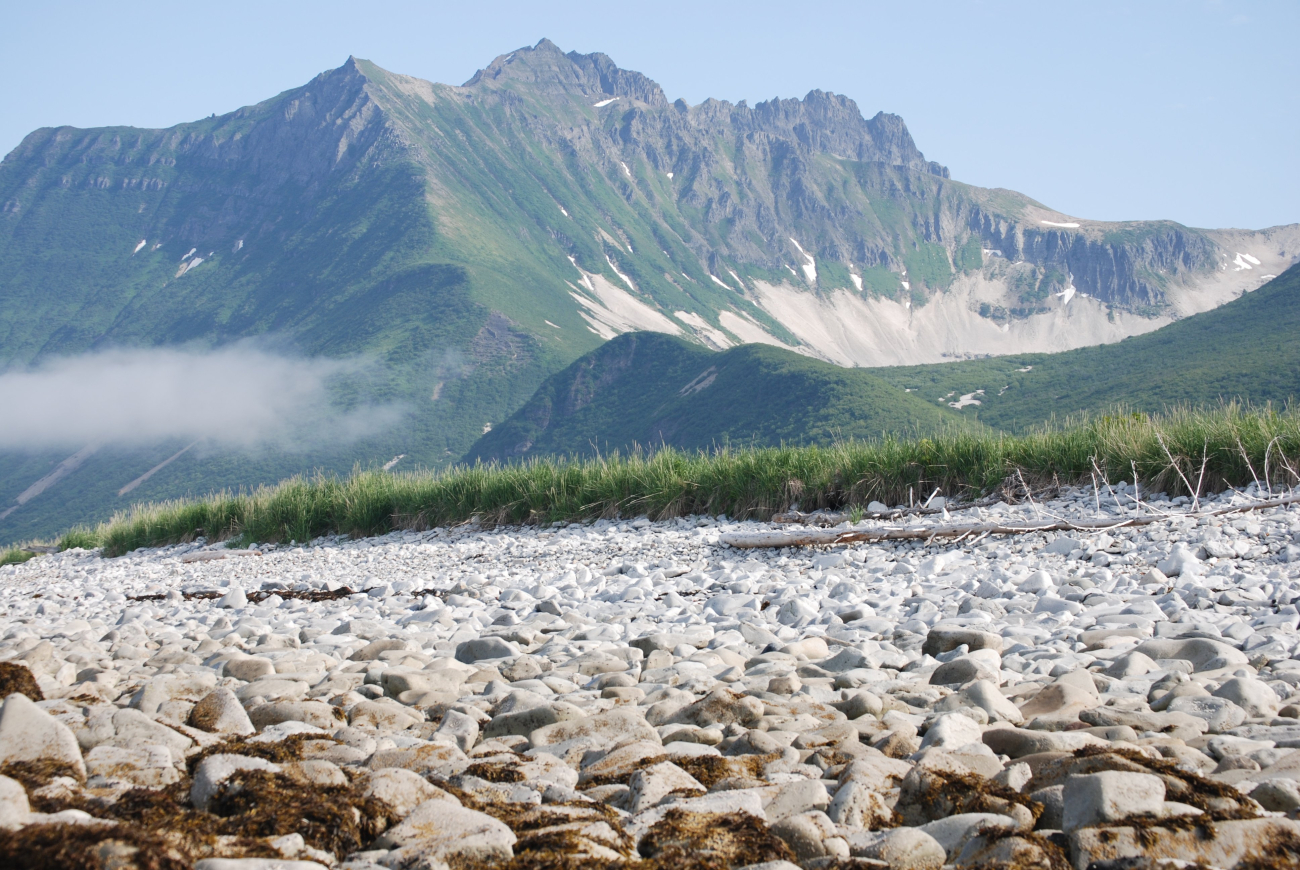 Looking over a boulder beach to rugged mountains of the Alaska Peninsula (Image credit: Mandy Lindeberg) Looking over a boulder beach to rugged mountains of the Alaska Peninsula