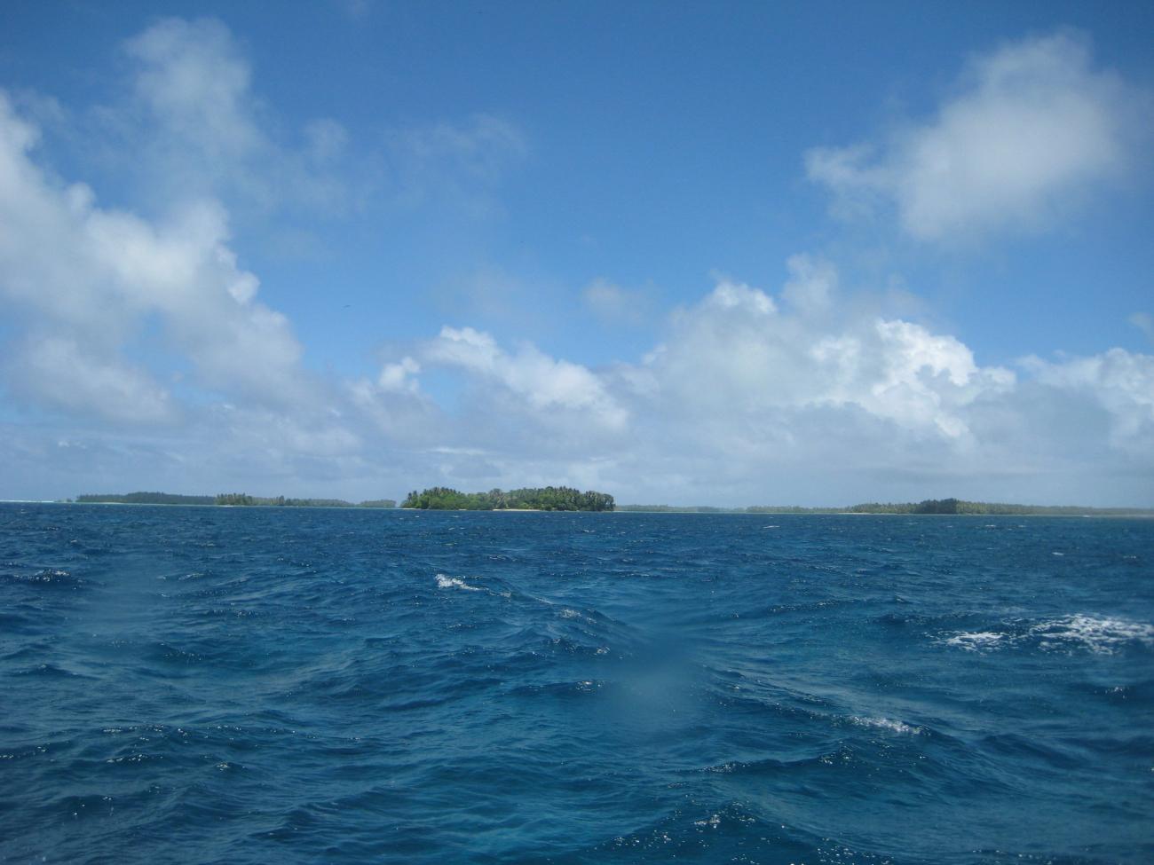 Palmyra Island seen looking astern from the NOAA Ship Hi'ialakai as itproceeds to its next project area (Image credit: LCDR Eric Johnson) Palmyra Island seen looking astern from the NOAA Ship Hi'ialakai as itproceeds to its next project area