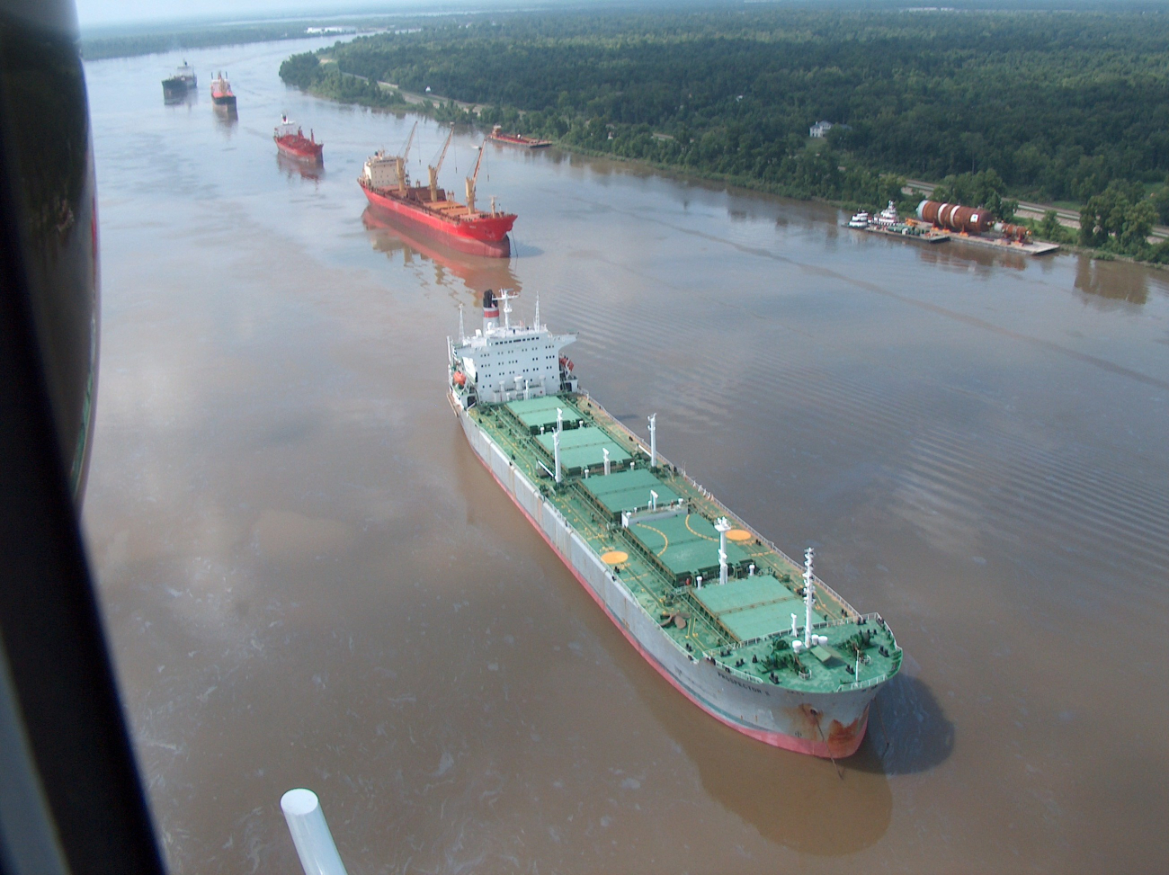 A few of the 70 or so vessels waiting to transit the Mississippi River following the collision of a fuel barge and a chemical tanker resulting in the spill of419000 gallons of oil (Image credit: NOAA News 072408) A few of the 70 or so vessels waiting to transit the Mississippi River following the collision of a fuel barge and a chemical tanker resulting in the spill of419000 gallons of oil