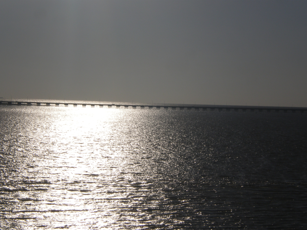 Lake Ponchartrain Causeway looking into the sunglint of late afternoon (Image credit: Officers and Crew of NOAA Ship PISCES; Collection of Commander Jeremy Adams, NOAA Corps) Lake Ponchartrain Causeway looking into the sunglint of late afternoon