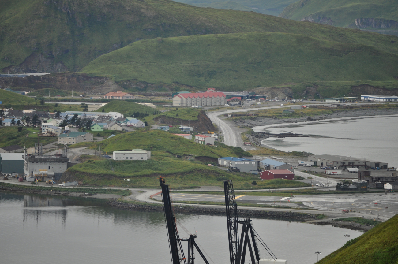Looking over the American President Lines container cranes to the end of theDutch Harbor Airport runway and the Grand Aleutian Hotel (Image credit: Mr. Tom Ward NOAA Teacher at Sea Program) Looking over the American President Lines container cranes to the end of theDutch Harbor Airport runway and the Grand Aleutian Hotel
