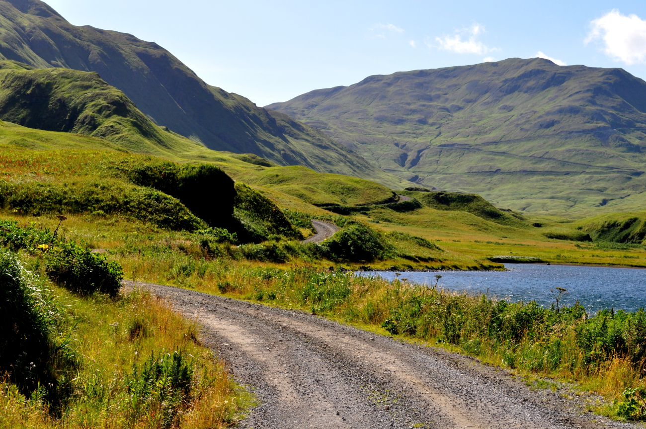 A gravel road leading into the mountains of Unalaska Island (Image credit: Mr. Tom Ward NOAA Teacher at Sea Program) A gravel road leading into the mountains of Unalaska Island