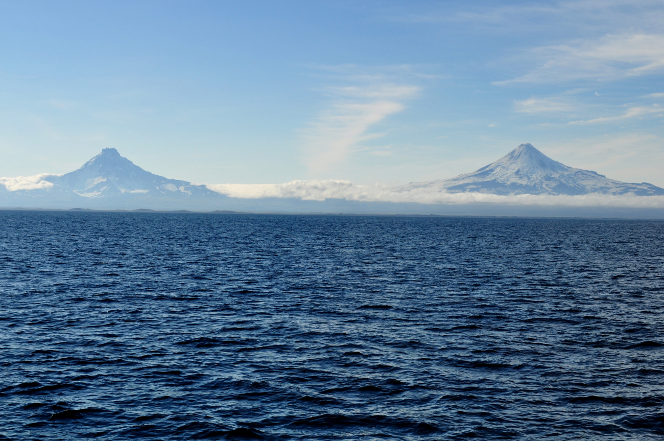 Shishaldin Volcano on the right and Isanotski Volcano on the left as seenfrom the Bering Sea side of the Aleutian Islands (Image credit: Mr. Tom Ward NOAA Teacher at Sea Program) Shishaldin Volcano on the right and Isanotski Volcano on the left as seenfrom the Bering Sea side of the Aleutian Islands