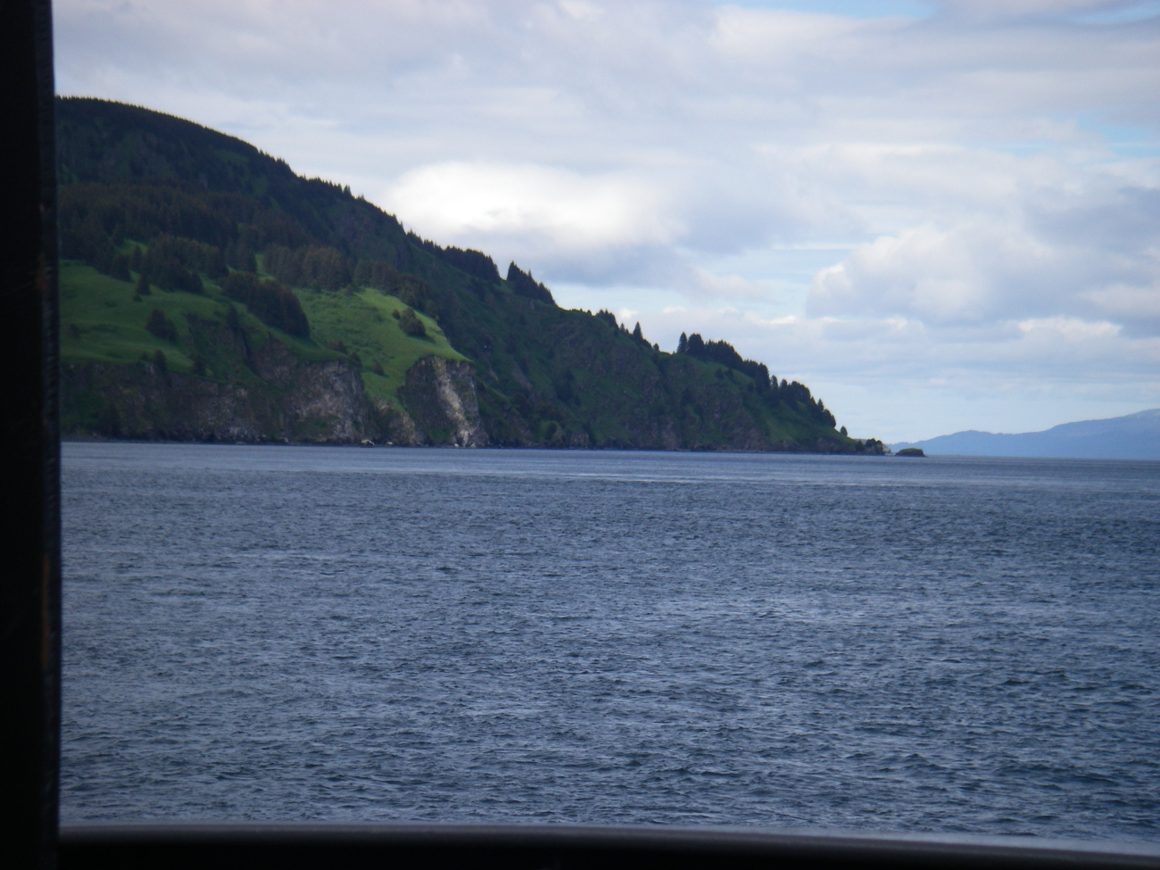 Rugged cliffs and headlands partially framed by the OSCAR DYSON (Image credit: NOAA Teacher at Sea Program | Jason Moeller Knoxville Zoological Gardens TN) Rugged cliffs and headlands partially framed by the OSCAR DYSON