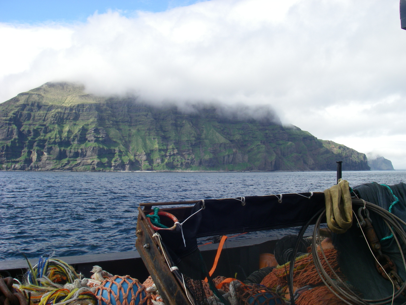 Layer upon layer of volcanic flows formed this cliff on Unimak Island (Image credit: NOAA Teacher at Sea Program | Jason Moeller Knoxville Zoological Gardens TN) Layer upon layer of volcanic flows formed this cliff on Unimak Island