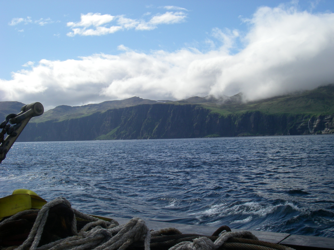 Clouds pouring over an Aleutian island (Image credit: NOAA Teacher at Sea Program | Jason Moeller Knoxville Zoological Gardens TN) Clouds pouring over an Aleutian island