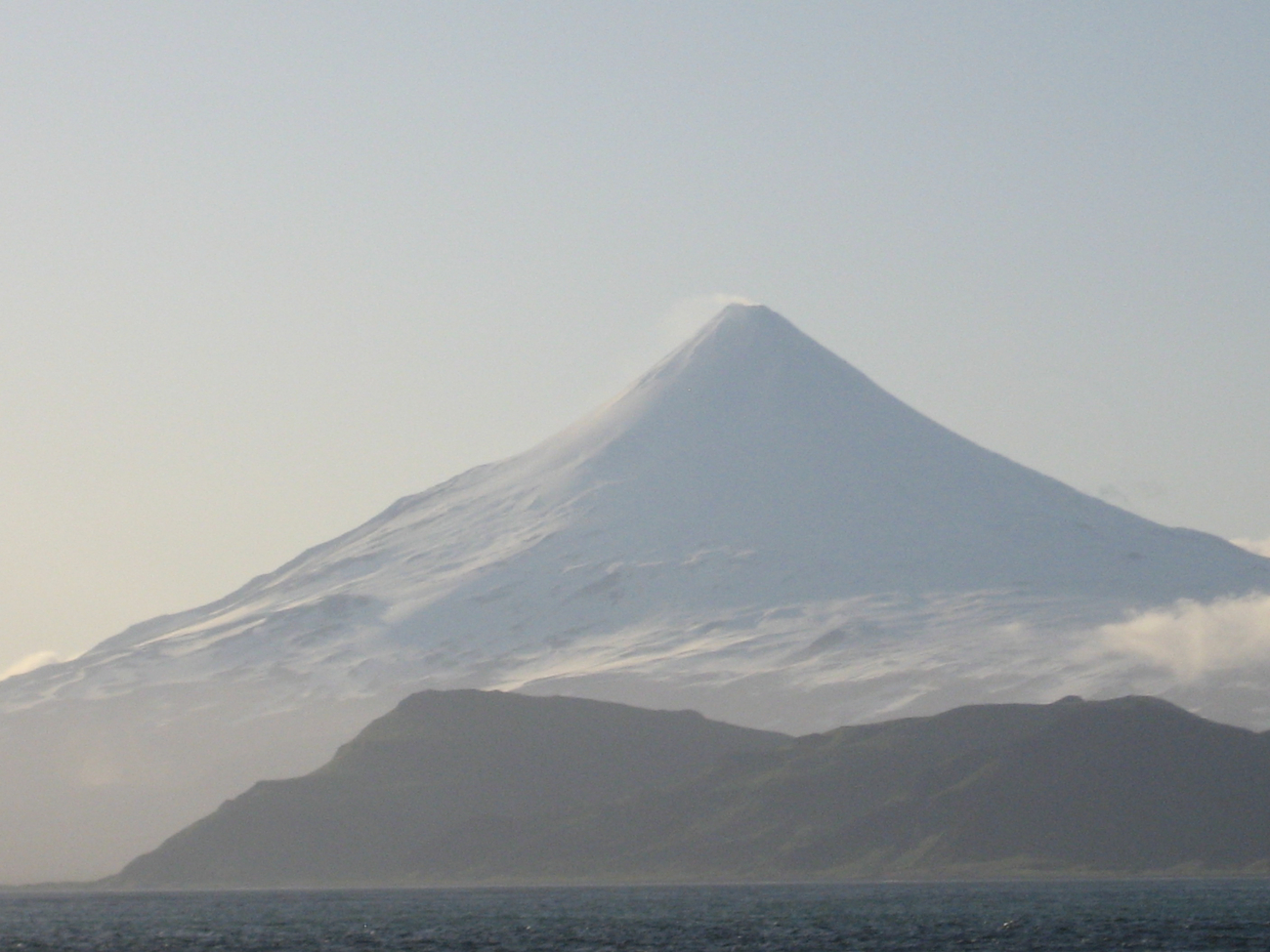Shishaldin Volcano on a hazy day line6062.jpg Shishaldin Volcano on a hazy day