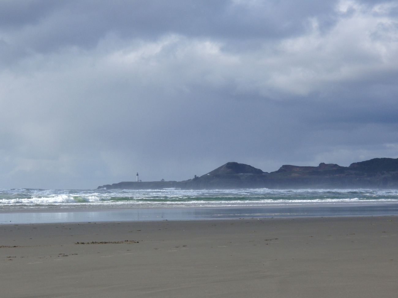 The beach at Newport with Yaquina Head Lighthouse in the distance (Image credit: Crew and Officers of NOAA Ship MILLER FREEMAN) The beach at Newport with Yaquina Head Lighthouse in the distance