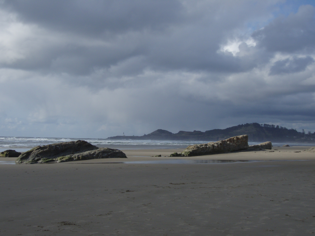 The beach at Newport with Yaquina Head Lighthouse in the distance (Image credit: Crew and Officers of NOAA Ship MILLER FREEMAN) The beach at Newport with Yaquina Head Lighthouse in the distance