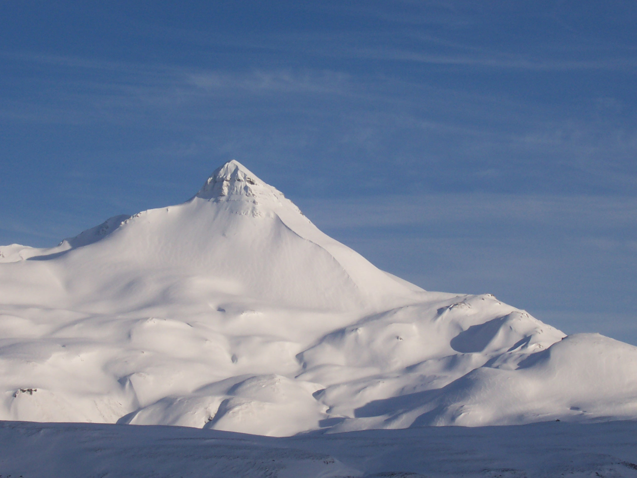 A snow-covered Pyramid Peak in the waning days of winter (Image credit: Crew and Officers of NOAA Ship MILLER FREEMAN) A snow-covered Pyramid Peak in the waning days of winter