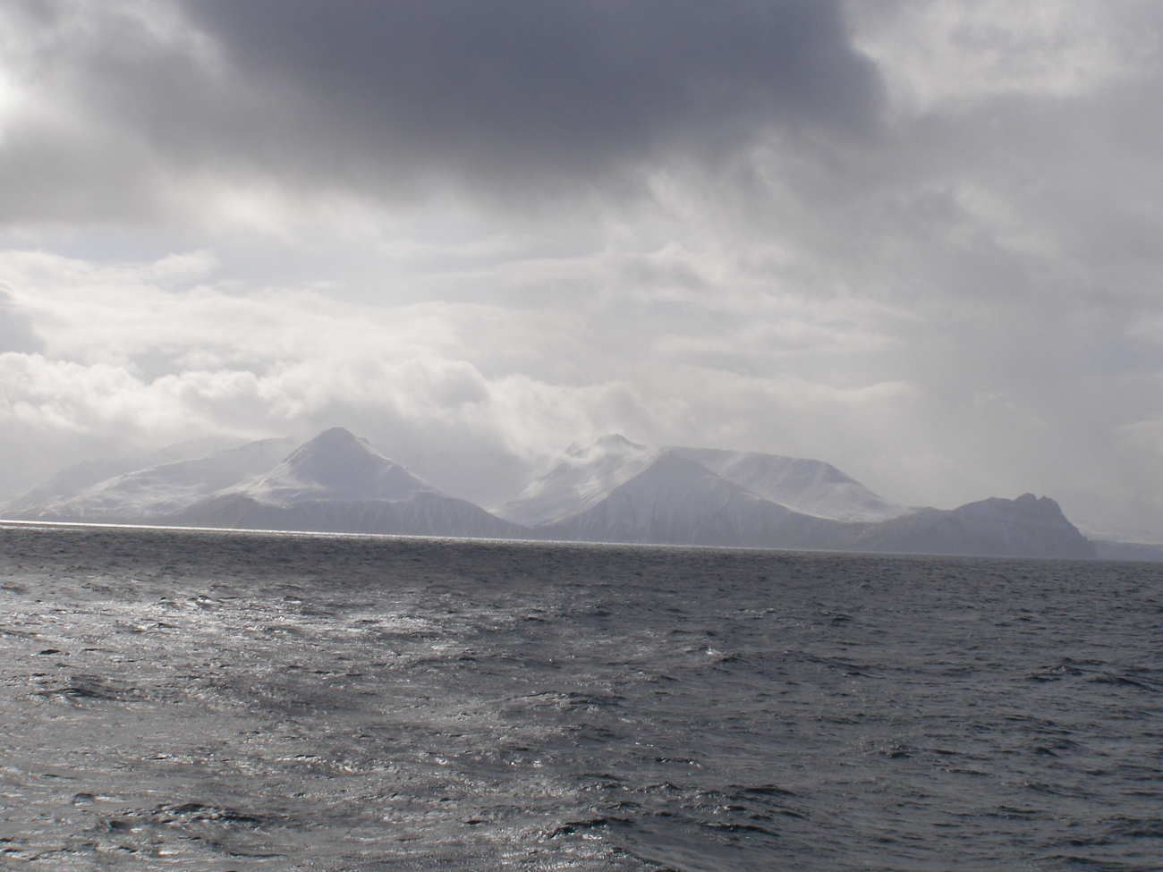 A typical Aleutian day with clouds, snow, and grey leaden sea (Image credit: Crew and Officers of NOAA Ship MILLER FREEMAN) A typical Aleutian day with clouds, snow, and grey leaden sea