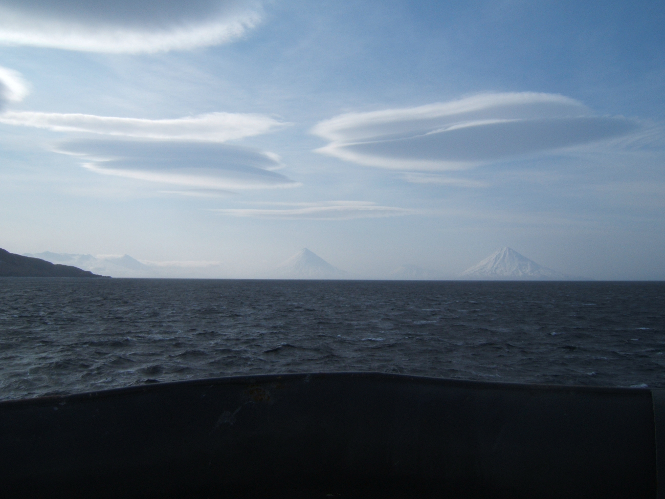 Lenticular clouds seen over the Islands of the Four Mountains (Image credit: Crew and Officers of NOAA Ship MILLER FREEMAN) Lenticular clouds seen over the Islands of the Four Mountains