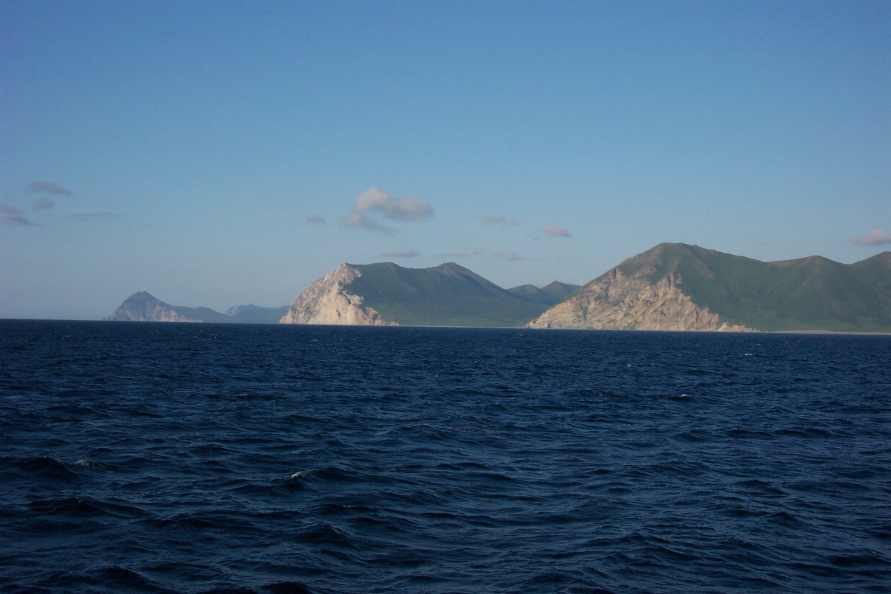 Triangular facets and intervening valleys along a a faulted coastline (Image credit: Crew and Officers of NOAA Ship MILLER FREEMAN) Triangular facets and intervening valleys along a a faulted coastline