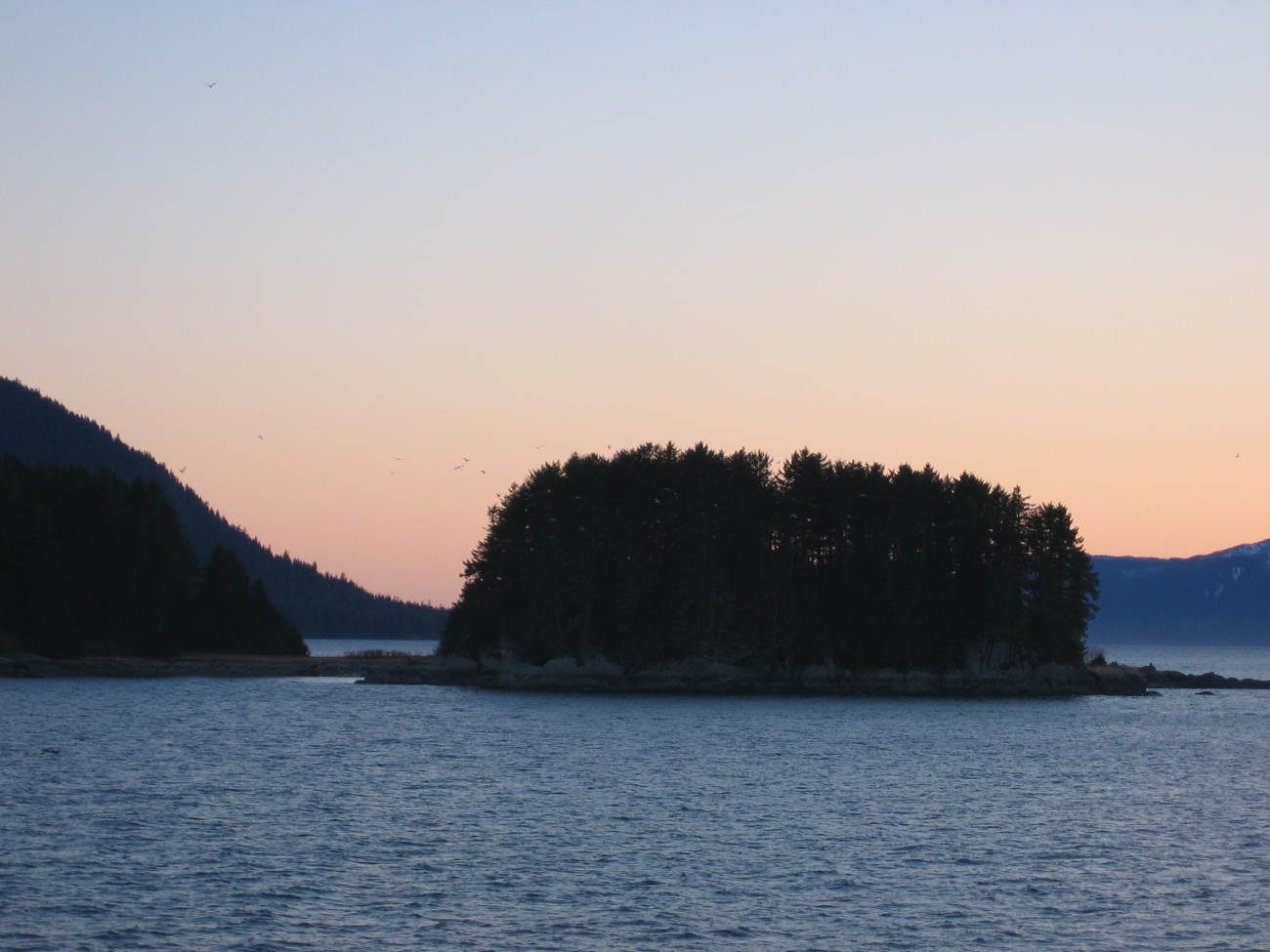 A small islet or perhaps just an extension of the mainlandconnected by a small isthmus (Image credit: Crew and Officers of NOAA Ship FAIRWEATHER) A small islet or perhaps just an extension of the mainlandconnected by a small isthmus