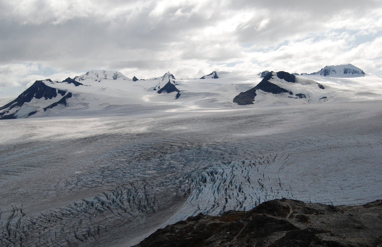 Highly crevassed glacier and surrounding mountain peaks (Image credit: Crew and Officers of NOAA Ship FAIRWEATHER) Highly crevassed glacier and surrounding mountain peaks