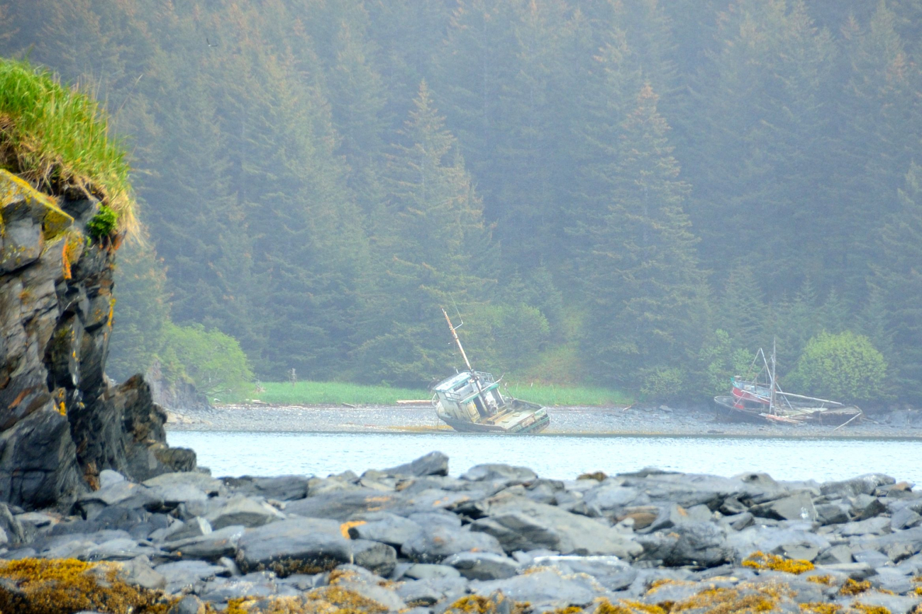 Derelict fishing boats on the shore on Kodiak Island (Image credit: Crew and Officers of NOAA Ship FAIRWEATHER | Weston Renoud) Derelict fishing boats on the shore on Kodiak Island