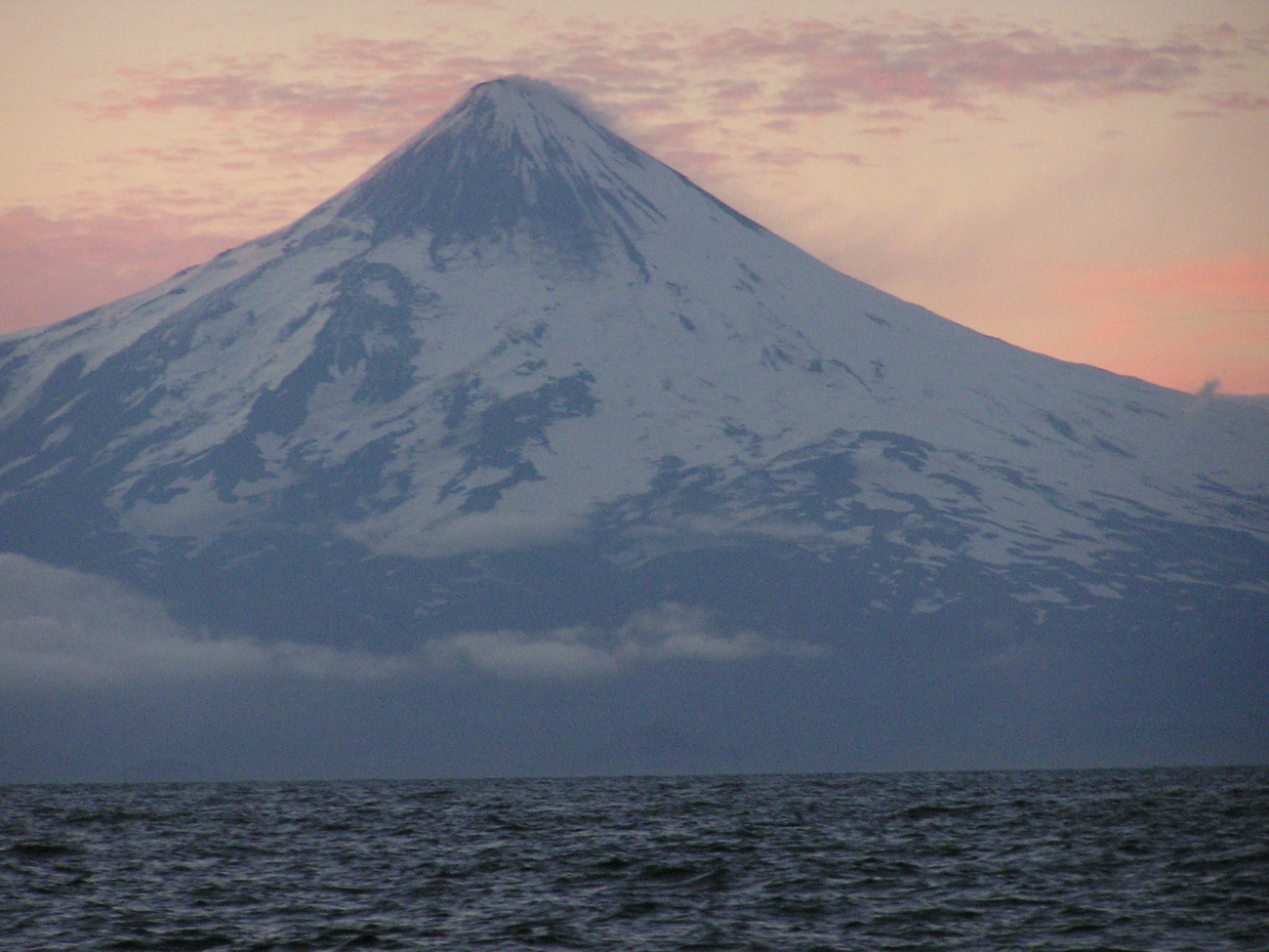 Shishaldin Volcano, among the most perfectly symmetrical volcanic cones on Earth (Image credit: Crew and Officers of NOAA Ship FAIRWEATHER) Shishaldin Volcano, among the most perfectly symmetrical volcanic cones on Earth
