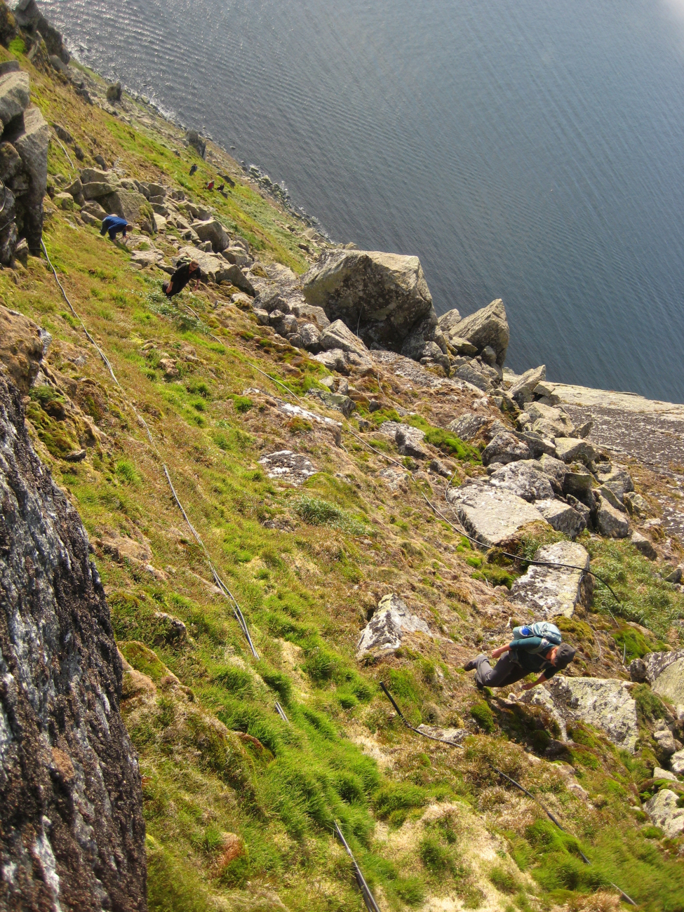 Climbing up the slope of Little Diomede Island (Image credit: Crew and Officers of NOAA Ship FAIRWEATHER) Climbing up the slope of Little Diomede Island