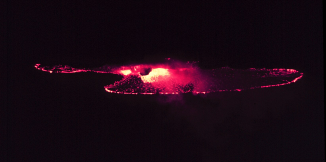 Halemaumau Fire Pit at night within Kilauea Crater at Volcanoes National Park