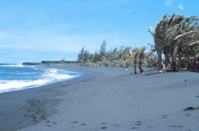 Black lava sand beach known locally as the Drainpipe - now destroyed by lavaflow