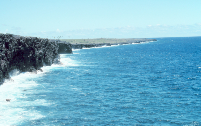 Black lava cliffs in the Kamoamoa area along southeast coast near Kilauea