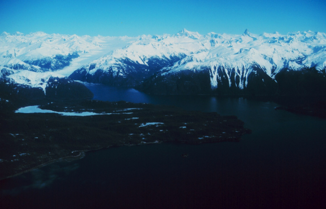 Baird Glacier to left, Mount Burkett, and Devil's Thumb as seen from Thomas Bay