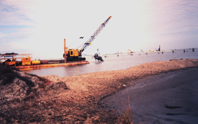 The Greenhill/East Timbalier dredging operation  -- bucket dredge scoopingmaterial from channel which will be sent by pipe to the marsh creation site