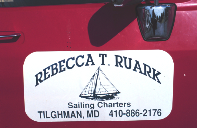 Advertising tourist trips on a sailing oyster dredger
