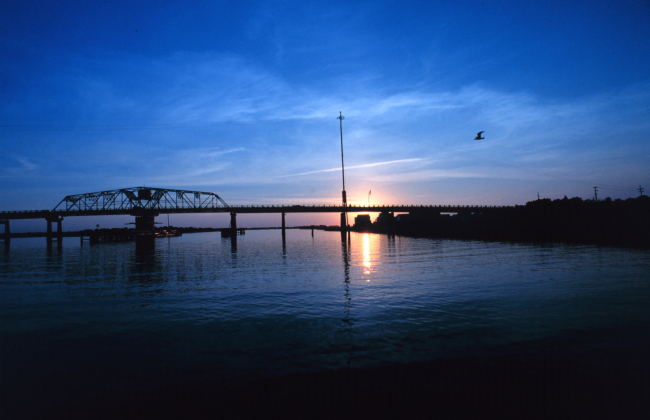 A sunset frames the Sullivan Island Bridge near Charleston