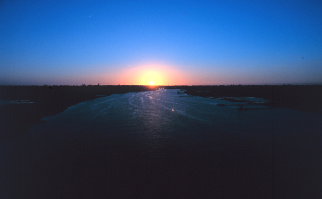 A sunset over coastal waters near Charleston