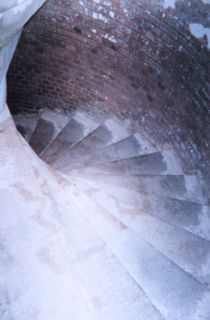 A spiral staircase leading down from the top of Fort Jefferson at Dry TortugasNational Park
