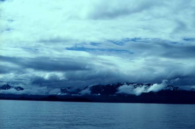 Clouds and mountains meet the sea on the Alaska Peninsula