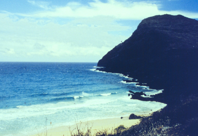 A volcanic headland jutting into the sea