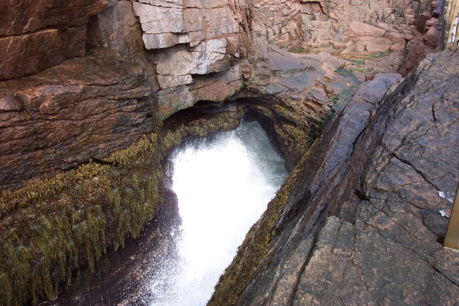 Thunder Hole - spray, water and thunderous sounds following the crash ofa North Atlantic swell